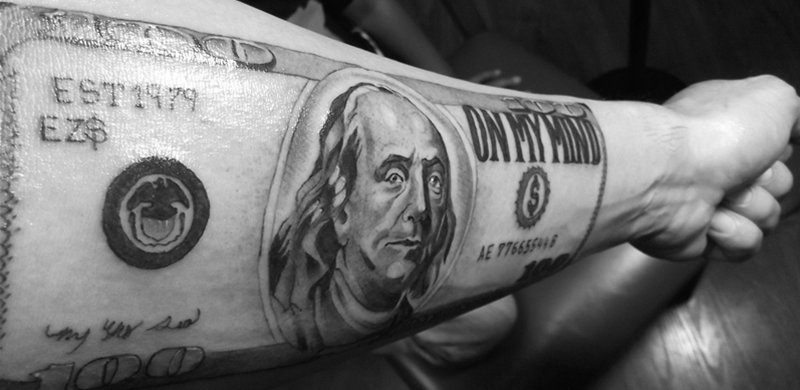 Black Solid Currency tattoo on hand for men