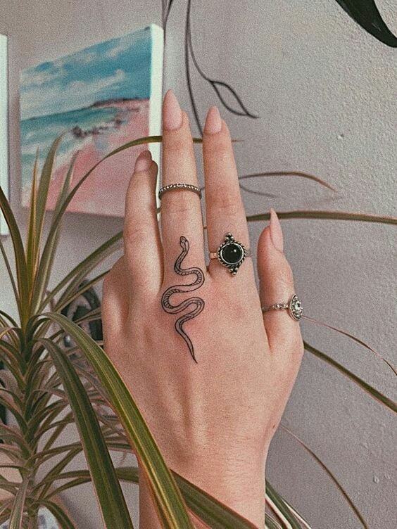 Small Aztec Snake Tattoo for women on finger