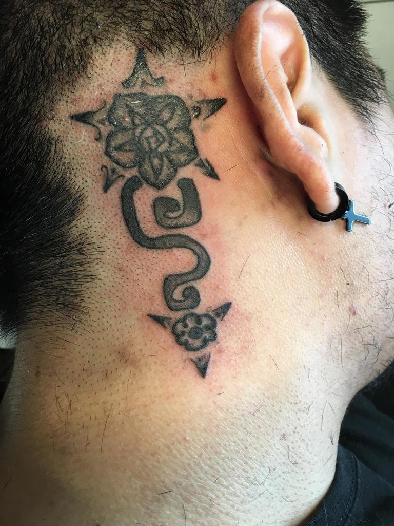 Aztec Snake Tattoo behind the ear for men