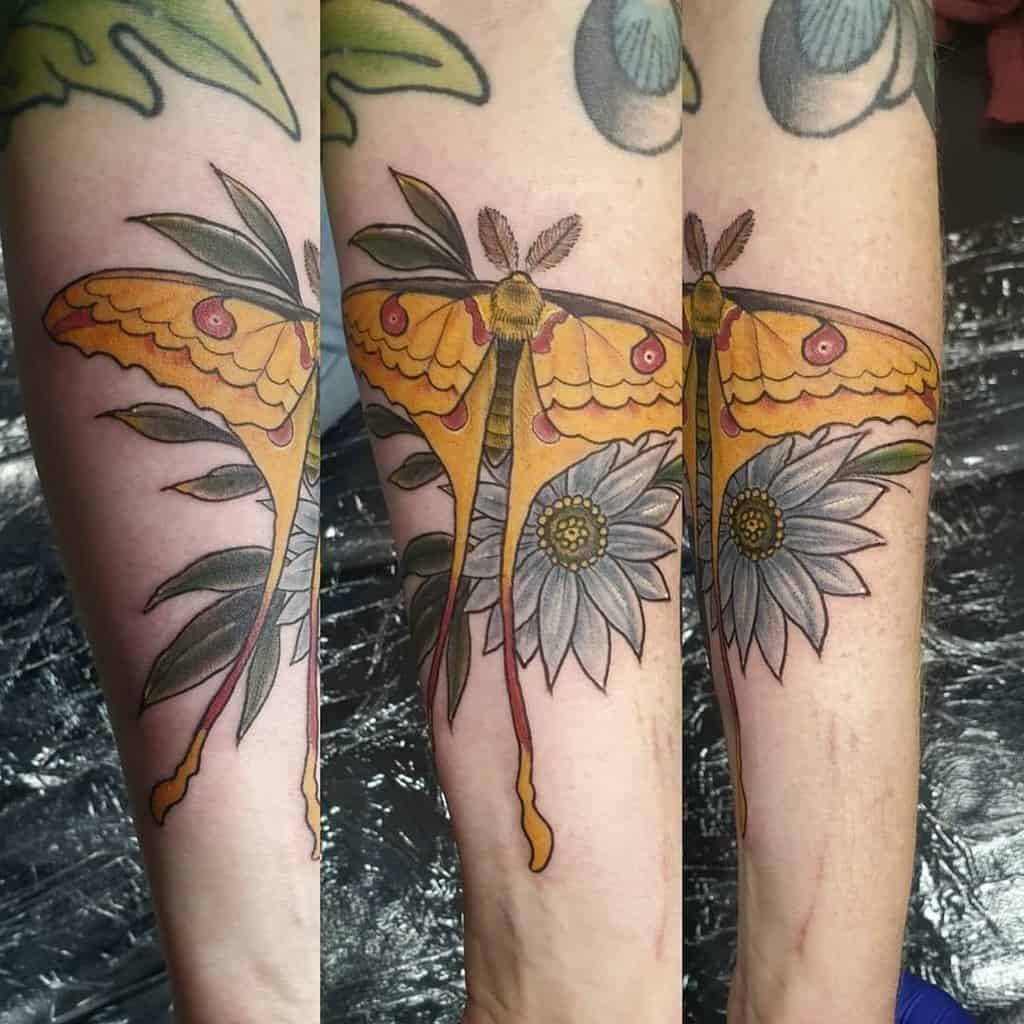 Beautiful luna moth tattoo on hand for women