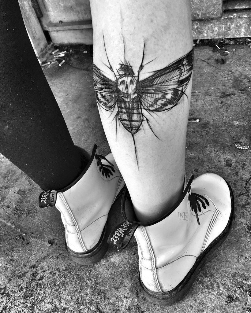 Sketch marks of death head moth tattoo
