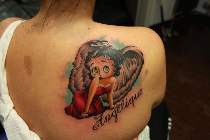 Betty boop tattoo at back for women