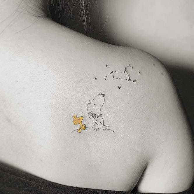 Tiny Snoopy Tattoo at back for women