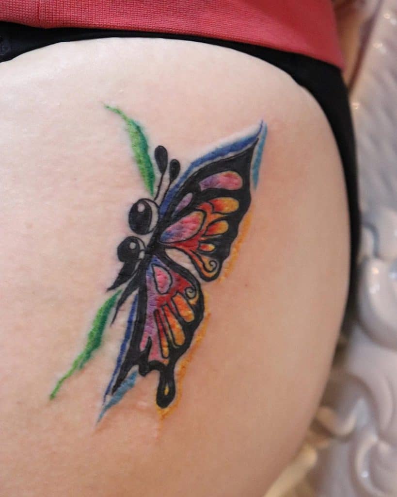 Tiny Semicolon Butterfly Tattoo on leg for women