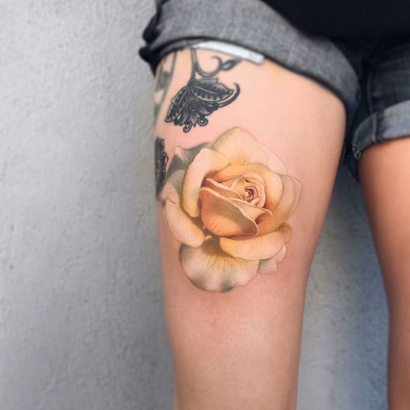 Yellow Rose tattoo on leg for women