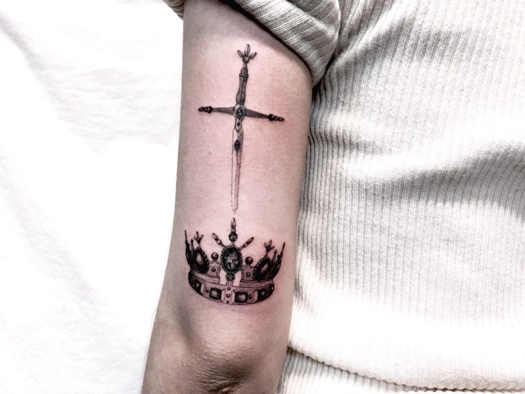 Sword and Crown Tattoo on hand
