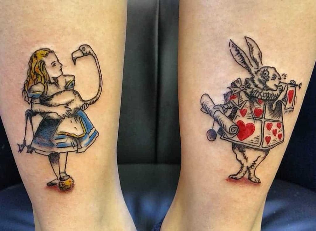 Amazing Alice in wonderland Tattoo on leg