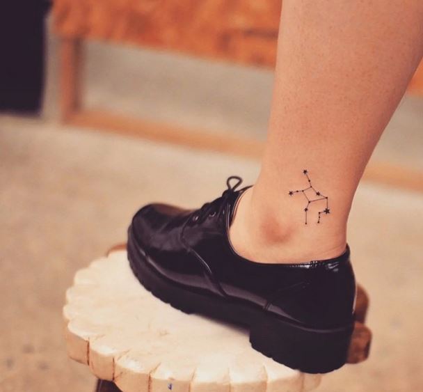 Tiny Virgo tattoo on leg for men