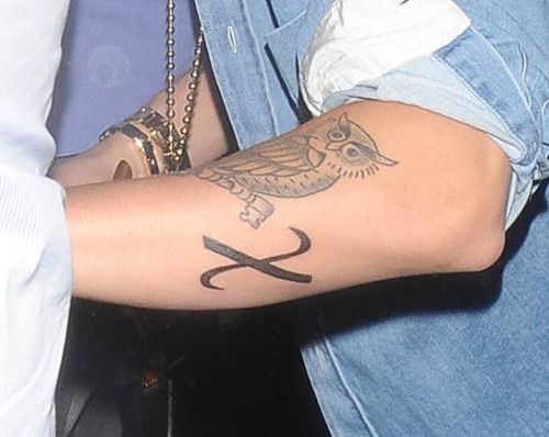 Justin Bieber chi tattoo on forearm