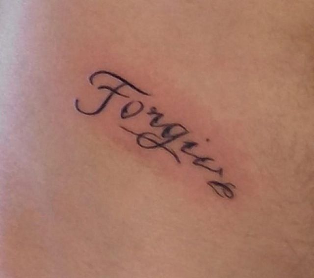 Justin Bieber forgive tattoo
