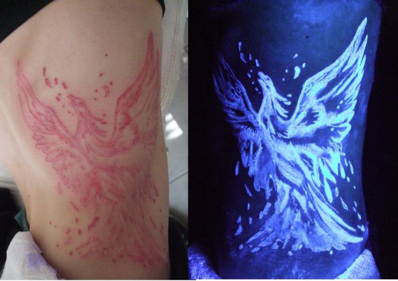 Cool bird UV Light Tattoo