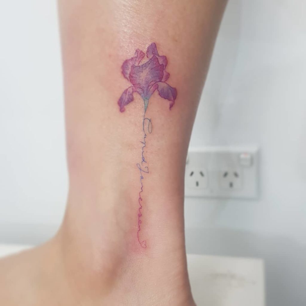 Purple Iris flower tattoo on leg for women