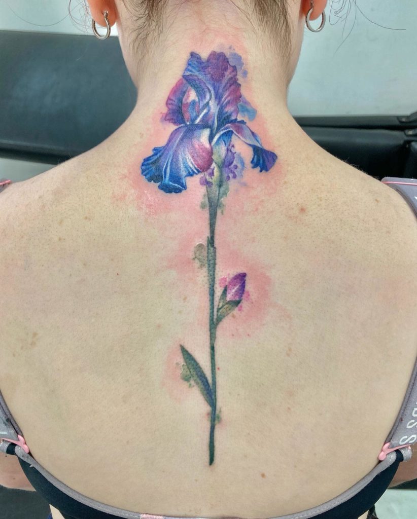 Blue Iris flower tattoo for women at back