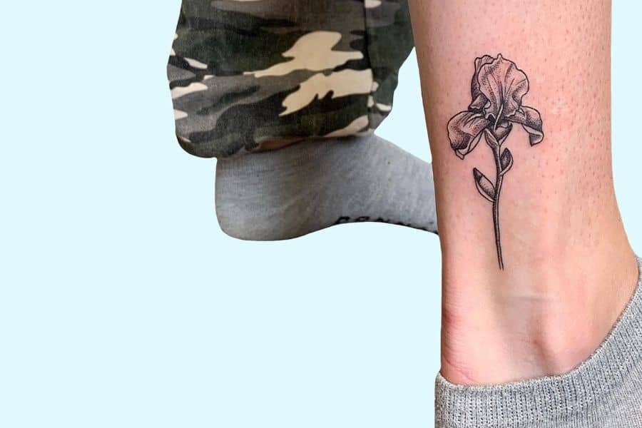 Iris flower tattoo on leg