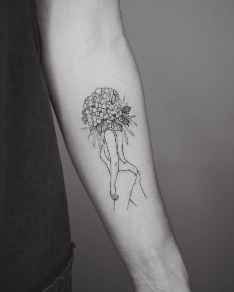 Long stem Hydrangea Tattoo for women on hand with black ink