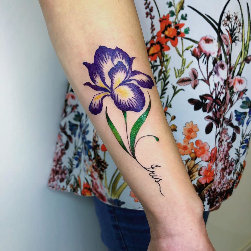Classy Blue Iris flower tattoo on hand for women