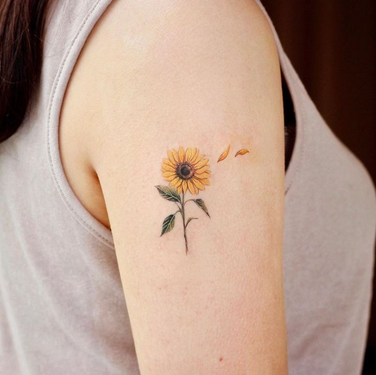 Sunflower tattoo for women on forearm