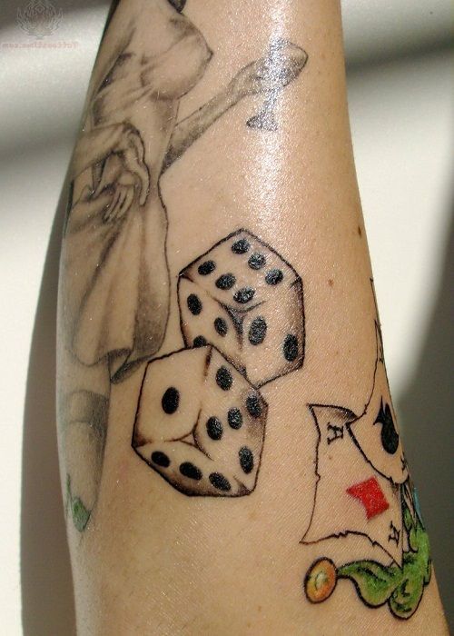 Domino tattoo on leg for women