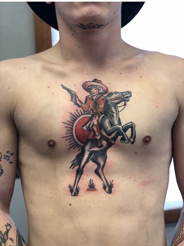 cowgirl tattoo on chest for man