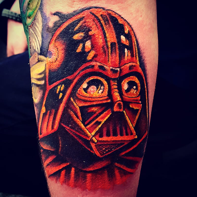 red and black color star war tattoo