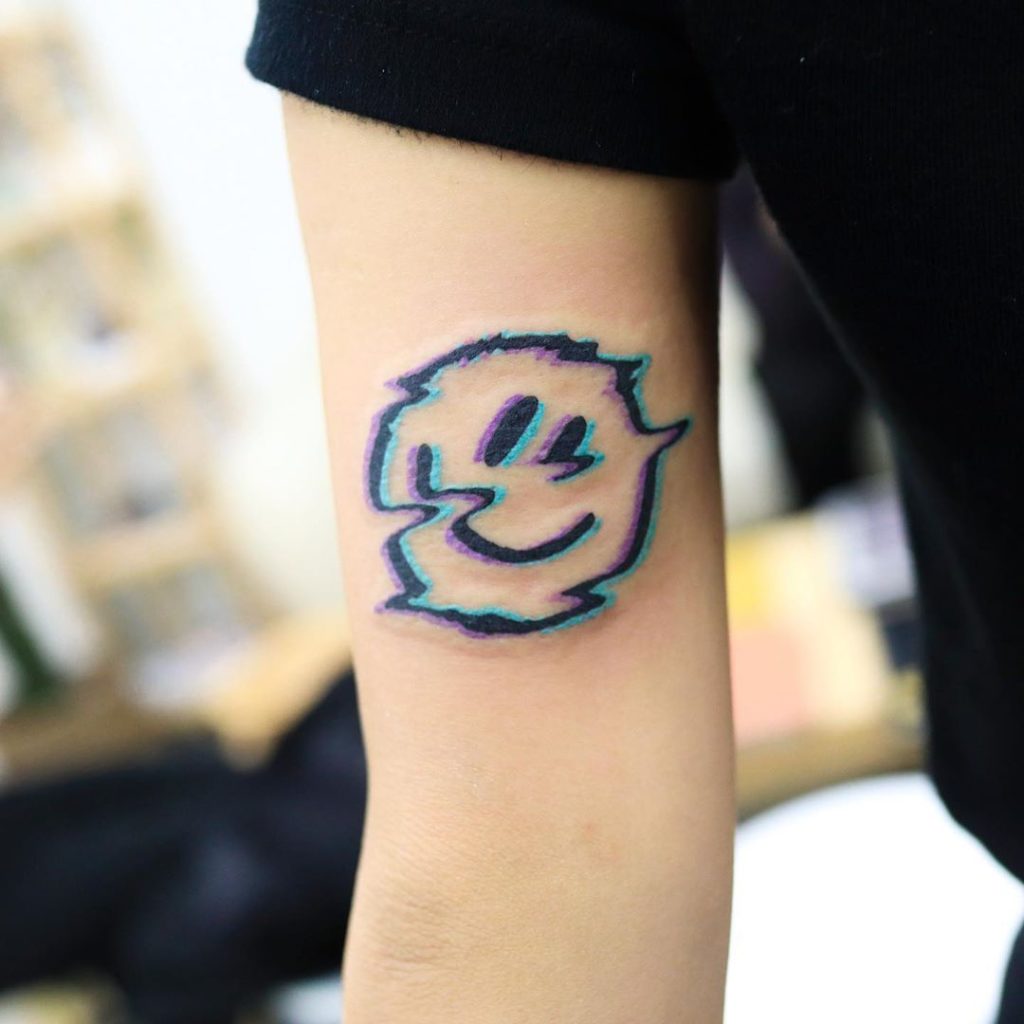 Smiley Tattoo on hand for men